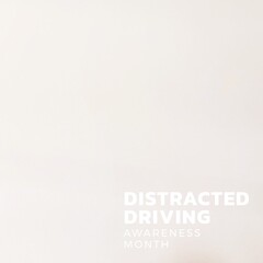 Composition of distracted driving awareness month text over white background