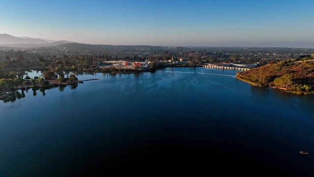Silent shores of Lake Murray San Diego with baseball pitch at shores aerial 