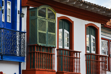 Fototapeta na wymiar The colonial house known as Casa do Muxarabiê, or House of the Mashrabiya, due to its islamic influenced wooden window and balcony, Diamantina, Minas Gerais state, Brazil