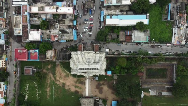 Top view of Hindu temple tower and suburban street. Bird's-eye view of Sri Kanchi Kamakshi Amman Temple, Kanchipuram, Tamil Nadu.