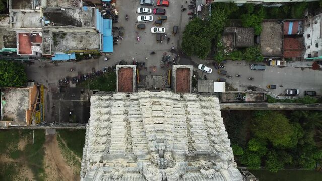 Top view of Hindu temple tower and suburban street. Bird's-eye view of of Sri Kanchi Kamakshi Amman Temple, Kanchipuram, Tamil Nadu.