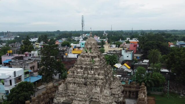 Pull back shot of Kailasanathar temple in Kanchipuram, Tamil Nadu. Aerial view of the Temple tower with beautiful God, and animal sculptures which are carved and sculpted mostly out of sandstone.