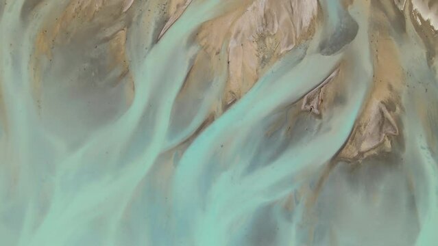 Beautiful river delta at head of glacial lake - aerial top down view