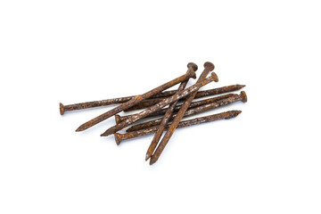 a pile of old rusty nails isolated on white background.
