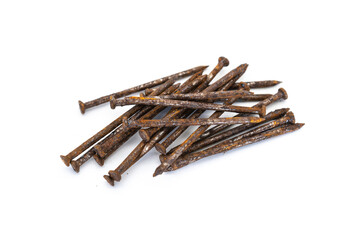 a pile of old rusty nails isolated on white background.