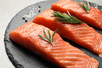 Fresh raw salmon and ingredients for marinade on grey, closeup