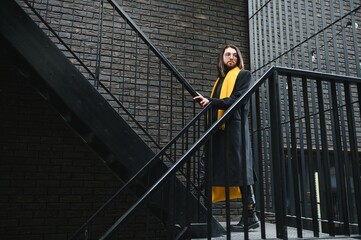 A gay man walks on the street. LGBT concept