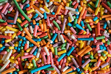 Festive texture background multicolored sweet sprinkles.