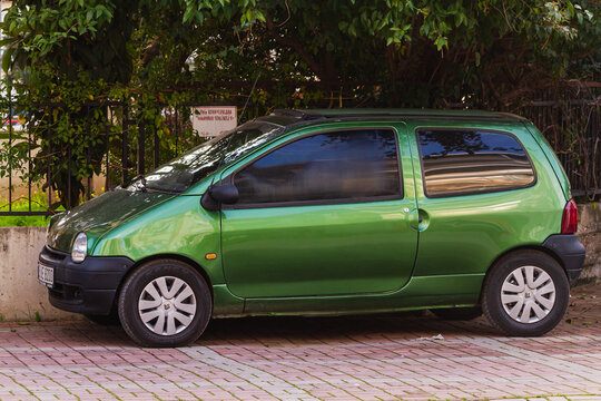  Side, Turkey -January 21, 2023:    green Renault Twingo  , side   view,  is parked  on the street on a warm summer day