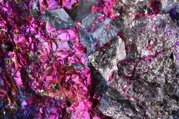 Background image of closeup Bornite mineral.