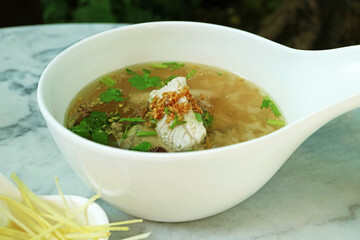 Bowl of Delectable Chinese Style Rice Porridge with Fish