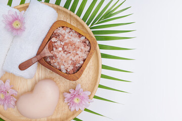 Mix of different salt types in a bowl. Sea salts, pink Himalayan. Spa product for female body, foot, hand spa, massage and candles, Relaxation. Flat lay. top view.
