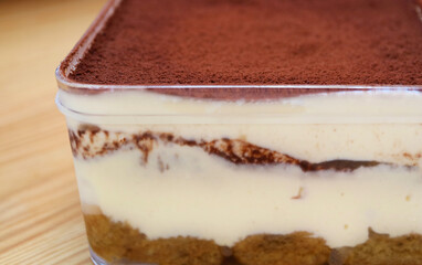 Closeup of Delectable Tiramisu, a Popular Italian Dessert Also known as Tuscan Trifle in Glass