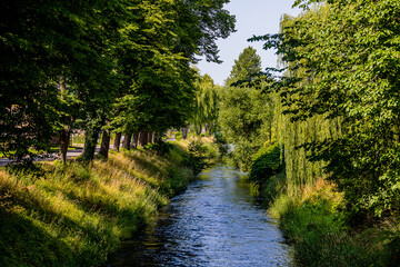  Łeba river flowing through Lębork Poland on a summer day - obrazy, fototapety, plakaty