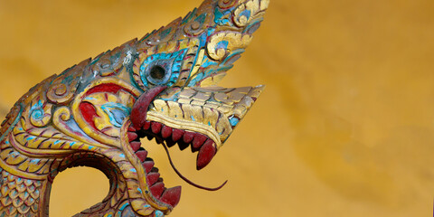 Colorful Antique carved head of dragon in the Si Saket temple  - Vientiane-Laos