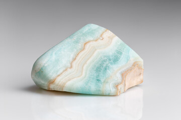 Polished Blue Aragonite Mineral Gem Stone on Grey