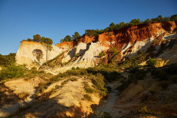 Colorado Provençal de Rustrel in Provence. Its different colored ochre rocks are well known. In some places ocher is still mined to obtain natural colors for the arts and crafts. France. Tourist.