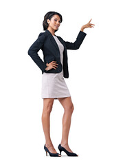 Full length shot of a young businesswoman posing with one hand on the hip and pointing with another...