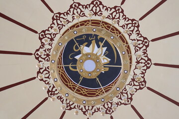The decoration in the mosque adds to the beauty of the room.