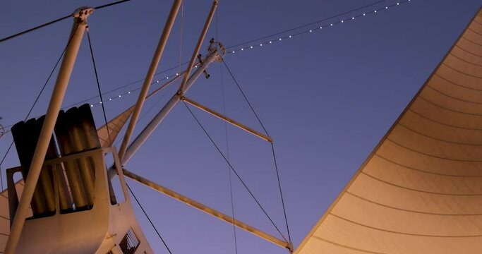 St Kitts Basseterre Caribbean cruise ship sails night. Worlds largest sailing ship. Cruise ship in Caribbean Ocean. Wind power. Passengers discover an authentic travel vacation at a slower pace.
