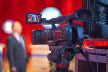 cameraman filming an interview
