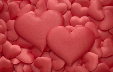 Love. St. Valentine's Day Beautiful background from hearts. Concept of love and romance. Red and pink hearts are beautifully laid out. Space for copy space and lettering. Valentine card