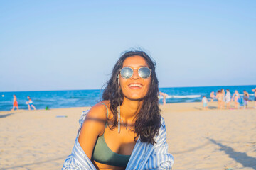 Young indian woman happy in the beach