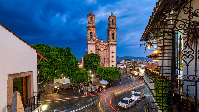 Taxco de Alarcon: Mexico's Silver Capital. An early evening view of Taxco’s Zocalo (city plaza) and its beautiful Templo de Santa Prisca. 