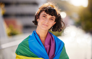 Love, freedom and portrait of woman with pride flag in city, happy non binary lifestyle of equality...