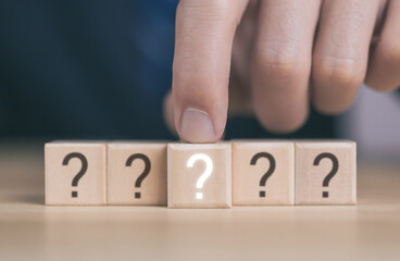 The wooden cube block shows a question mark icon.	
