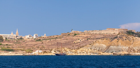 Coastal landscape of Mgarr on a sunny summer day, Gozo island