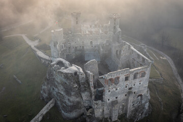 Ogrodzieniec Castle in the morning fog. Poland