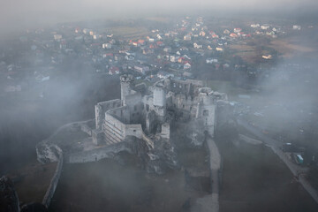 Ogrodzieniec Castle in the morning fog. Poland