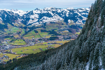 Aerial view of Kitzbuhel and snow covered Alps in Austria