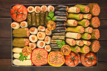 Arabic Cuisine; Middle Eastern dish called "Mahshi" or "Dolma" literally means "stuffed". It is a delicious hearty meal consists of assortment of vegetables stuffed with rice and fresh herbs. 