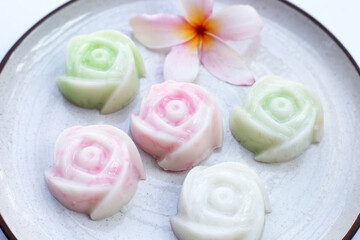 Fototapeta na wymiar Coconut milk rose shaped jelly with (salim) Thai sweet dessert