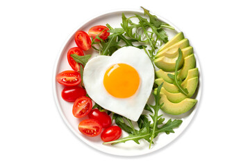Isolated breakfast for wife or girlfriend on Valentines Day, Womens Day or Mothers Day with heart shaped fried egg, avocado and vegetables, top view