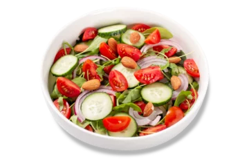 Fotobehang Isolated healthy salad with tomato, cucumber, greens and nuts, salad closeup  © Maria Shchipakina
