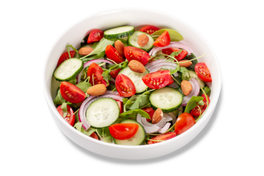Isolated healthy salad with tomato, cucumber, greens and nuts, salad closeup 