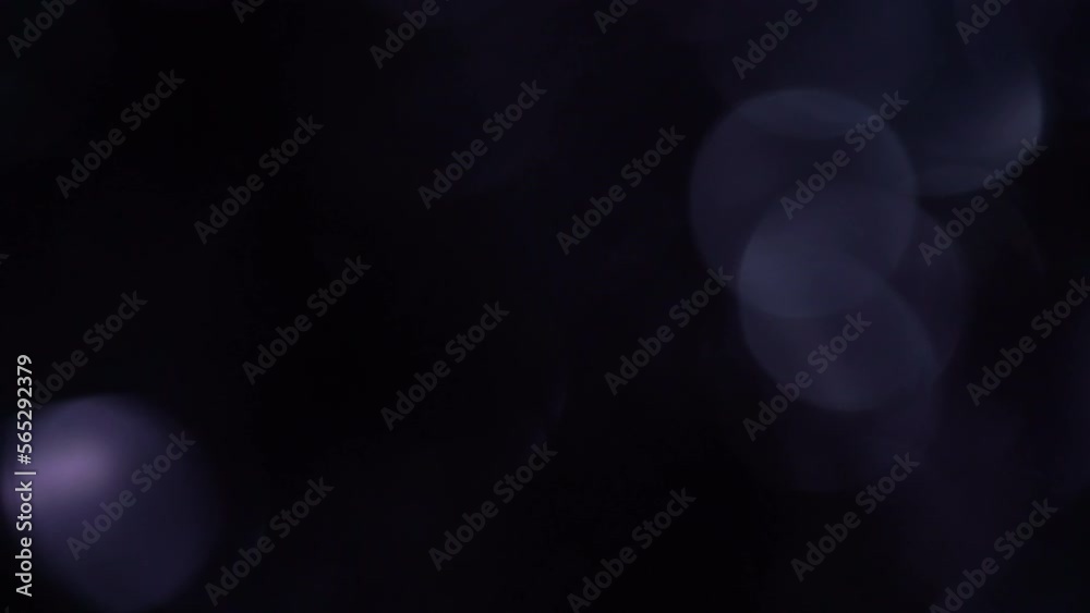 Canvas Prints dark bokeh glitter on black background. abstract movement of silver round bokeh on black. can be use