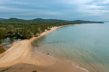 Aerial view of the sand beach with dark rocks in Phu Quoc Island, Vietnam
