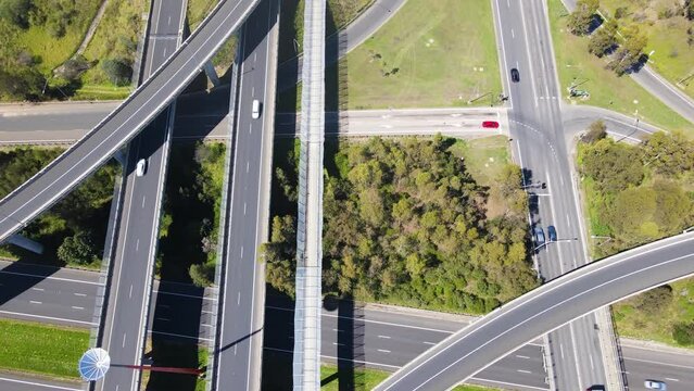 Aerial drone view rising up above the Light Horse Interchange in Sydney, NSW Australia at the junction of the M4 Western Motorway and the Westlink M7