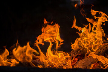fiery fire in the fireplace black background