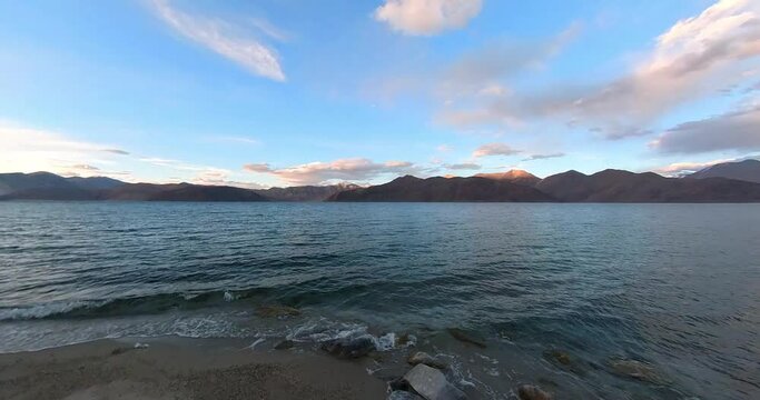 Pangong Lake with blue water calm breeze blowing, early morning clean view