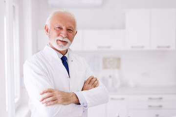 Portrait of senior male doctor