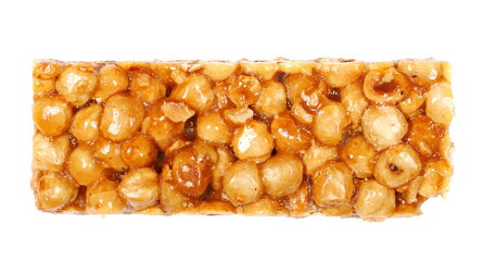 Hazelnut caramelized nut, candied bar isolated on white, top view