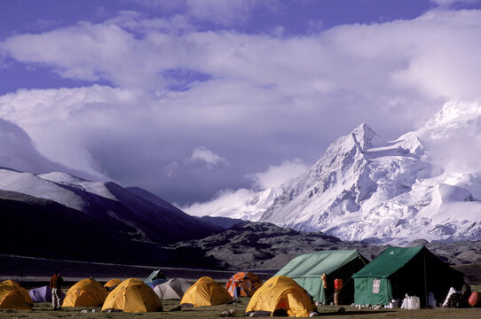 Tents and Cho Oyu seen from a Chinese Basecamp, Tibet.