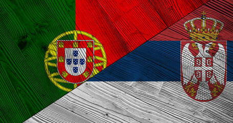 Background with flag of Portugal and Serbia on wooden split board. 3d illustration