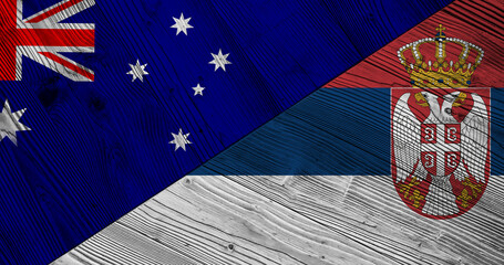 Background with flag of Serbia and Australia on wooden split board. 3d illustration