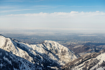 Fototapeta na wymiar View of the mountains near Shymbulak. Snow Mountains. Almaty